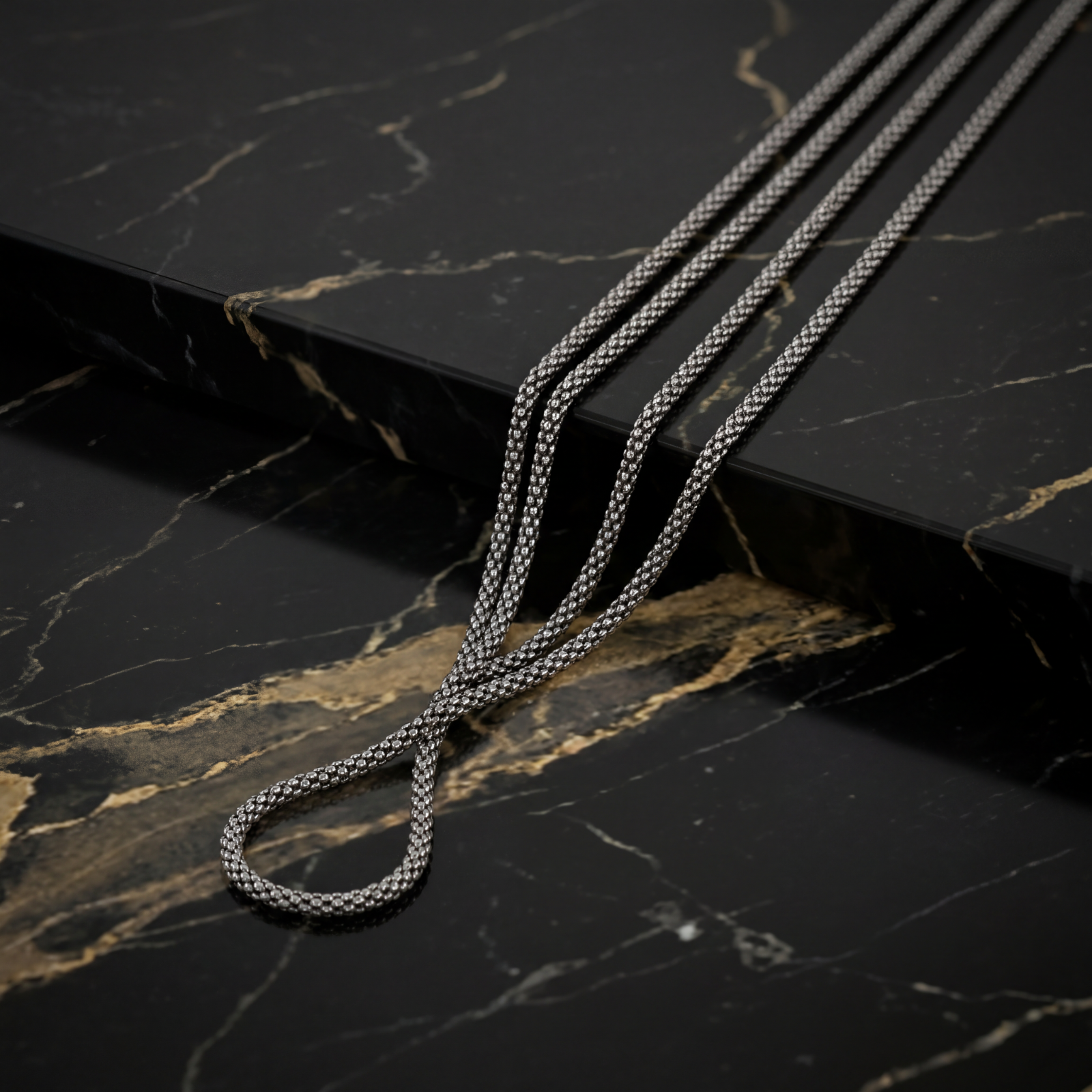 Coreana Popcorn Chain Rhodium 925 Sterling Silver Solid Italian Chain on a black marble surface
