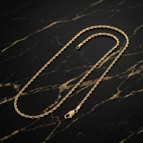 The 1MM Solid 14k over 925 Sterling Silver Italian Diamond Cut Rope Chain Necklace with a lobster clasp is displayed on a black marble surface with light tan veins.