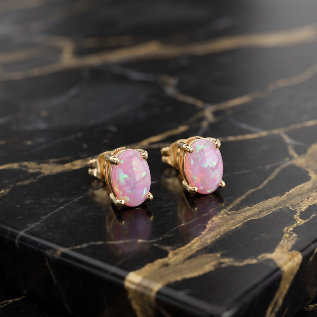 Pink Opal Earrings 14k Gold Over 925 Sterling Silver Lab Created 4x6mm on a black marble surface