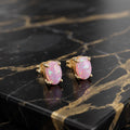 Pink Opal Earrings 14k Gold Over 925 Sterling Silver Lab Created 4x6mm on a black marble surface