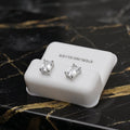 Emerald Cut Cz Earrings Clear 7x5mm 925 Sterling Silver on a white display stand