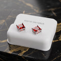 Ruby Red Cz Earrings Square Princess Cut 925 Sterling Silver on a white stand