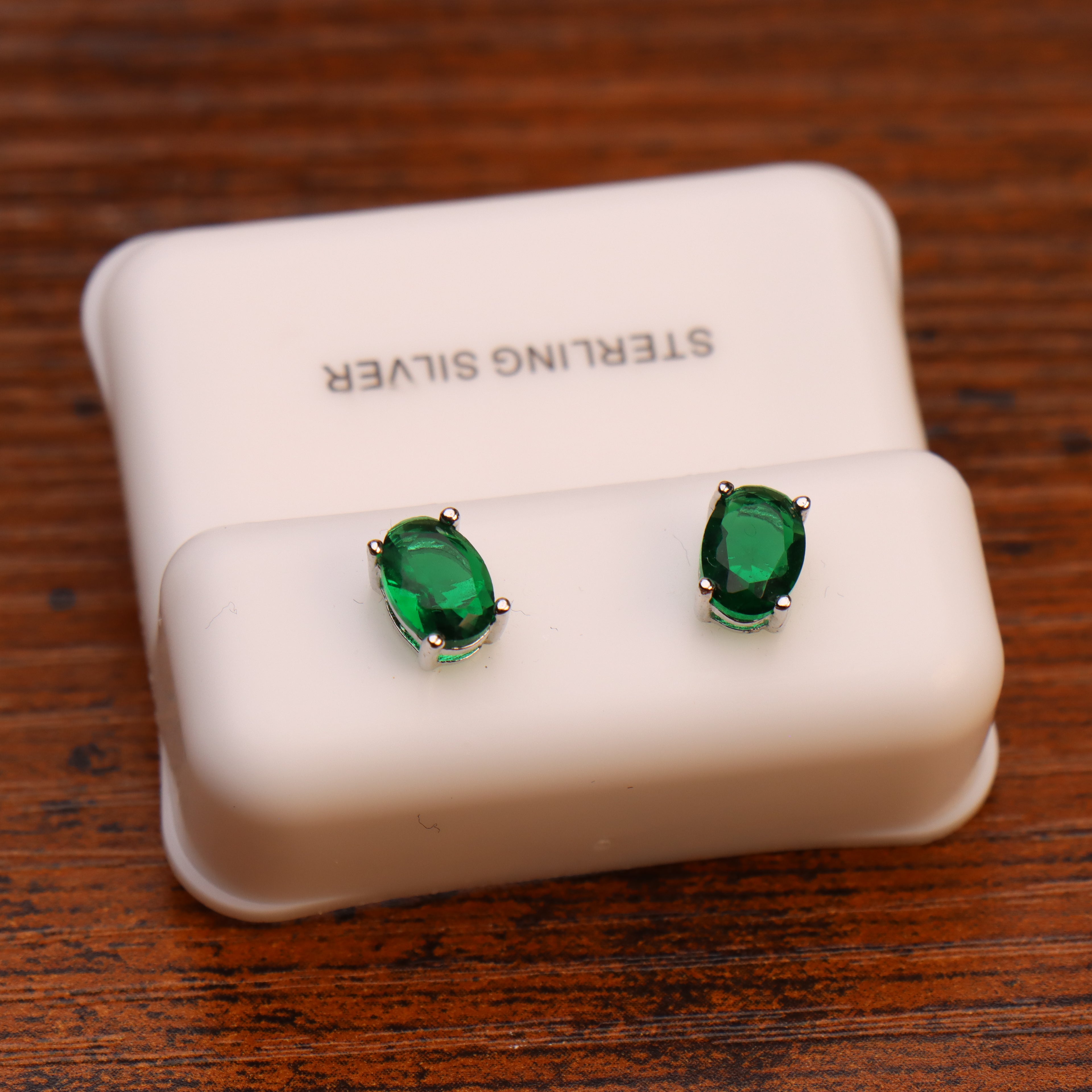 Oval green cubic zirconia stud earrings in 925 sterling silver