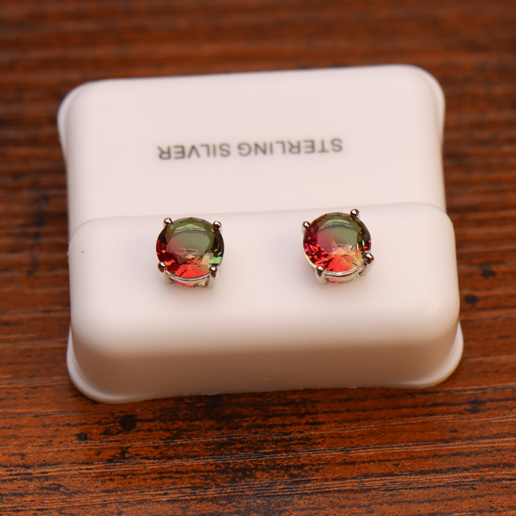 Round 7mm watermelon red and green cz earrings in 925 sterling silver on a white display stand