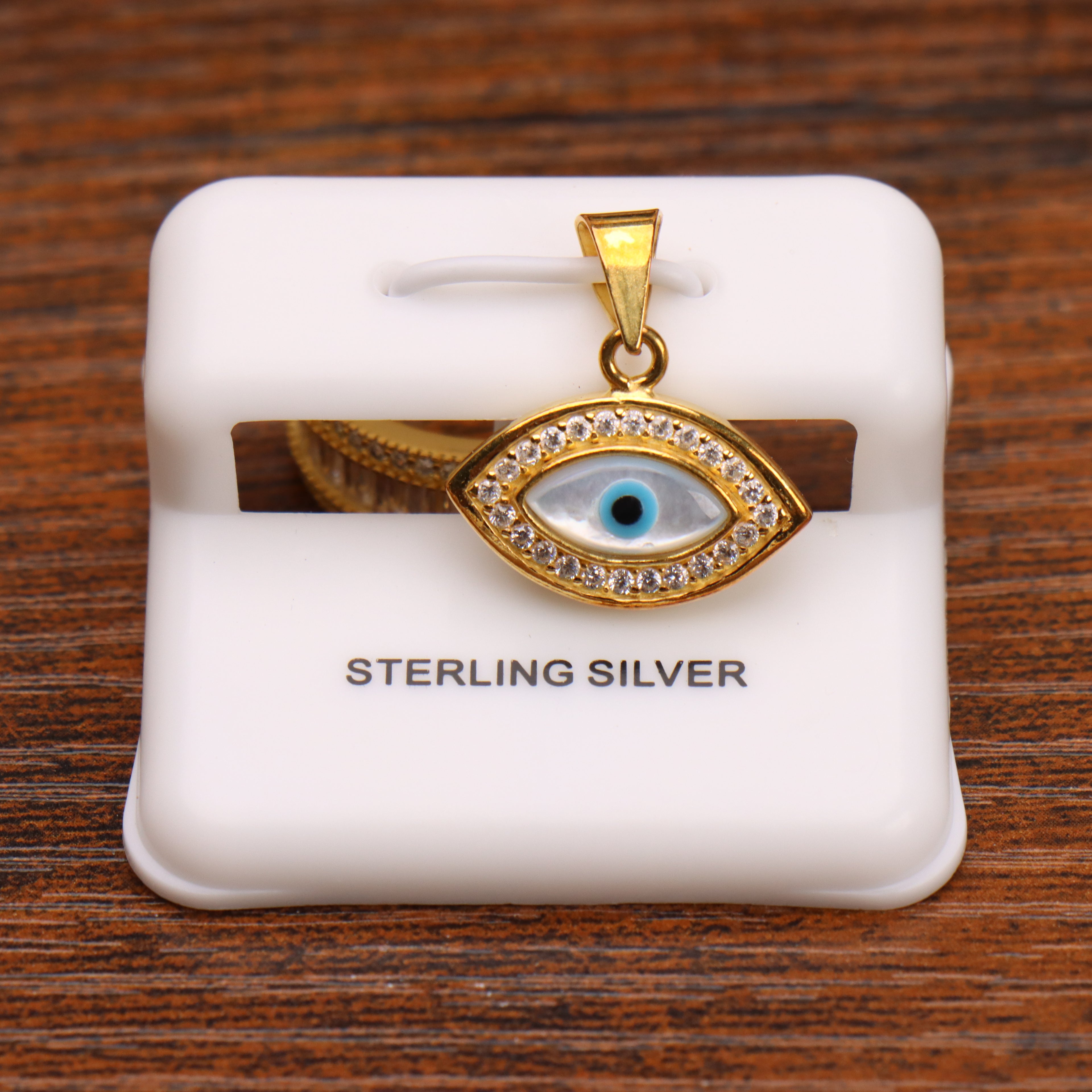 Evil eye halo pendant in 14k gold plated sterling silver with cubic zirconia stones