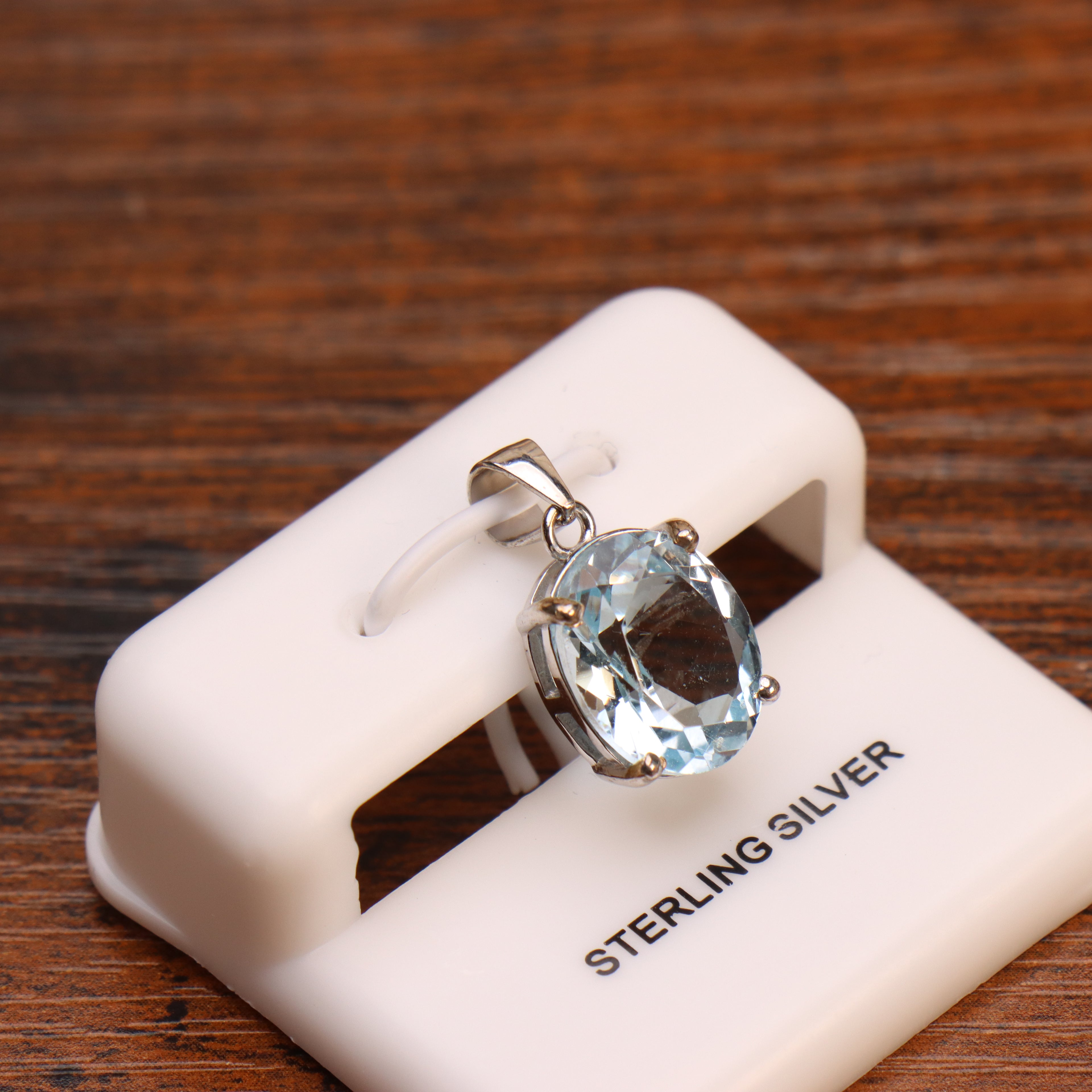Blue topaz oval semi precious natural pendant in 925 sterling silver