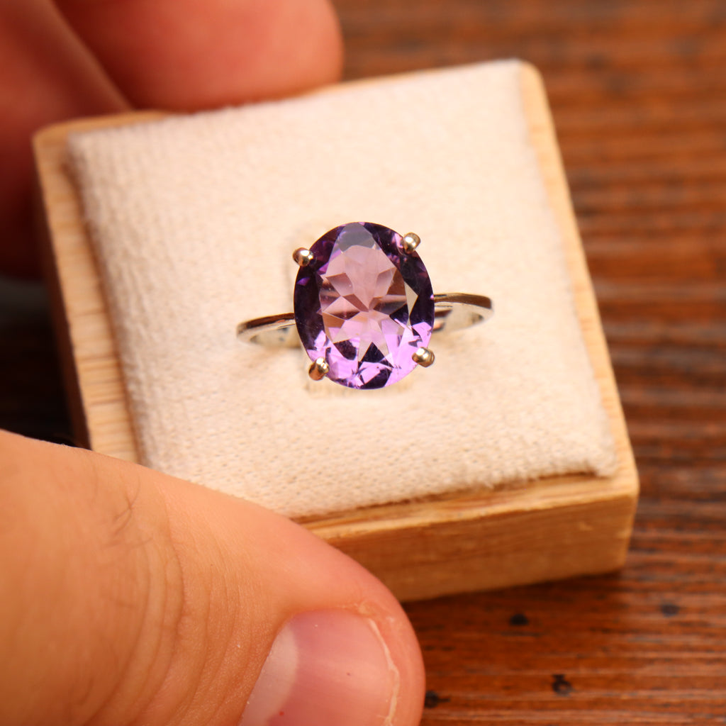Amethyst purple semi precious natural ring with oval cut stone set in 925 sterling silver