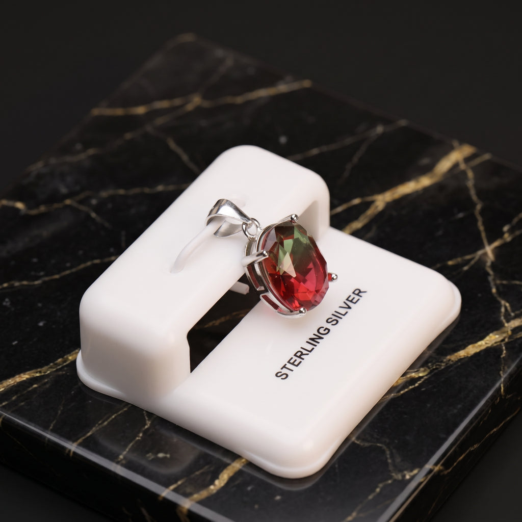 Watermelon oval semi precious natural pendant in 925 sterling silver on a white display stand